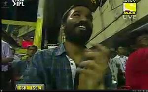 Actor Dhanush watching the match